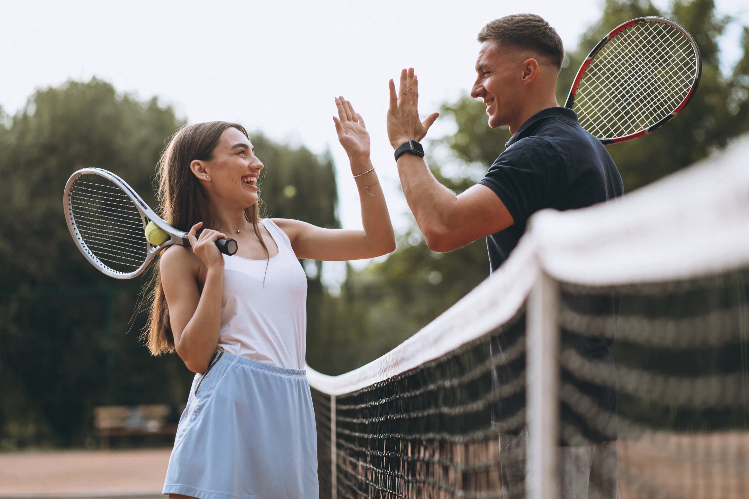 young-couple-playing-tennis-court